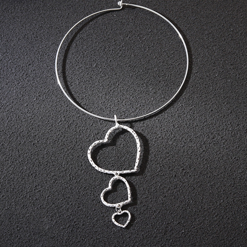 Silver Hoop Necklace with Cascading Heart Charms